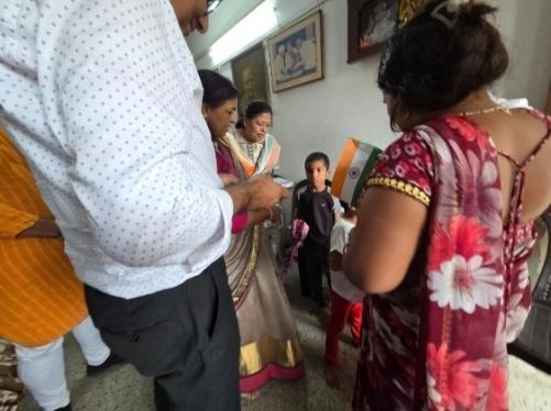 RCV One Rotarians distributing crayons to street children