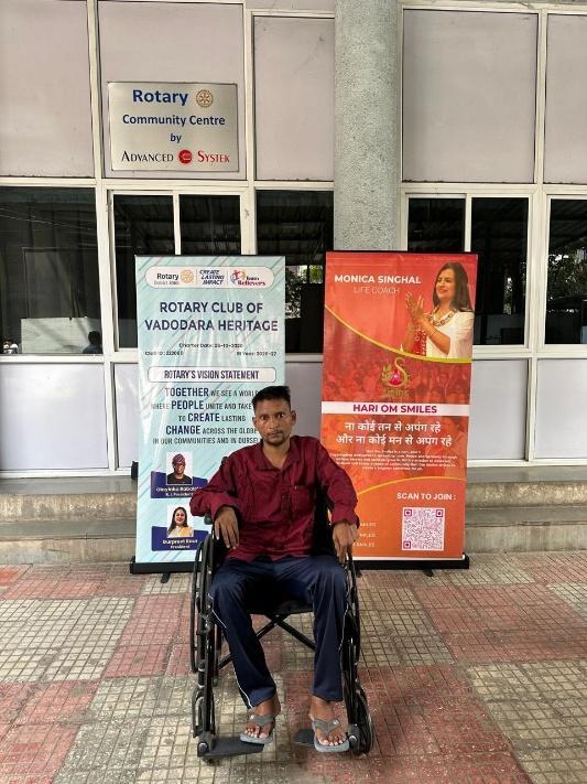 Rotarians offering encouragement to the beneficiary